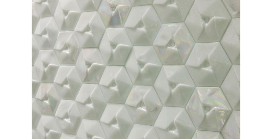 Sicis  Meteors is an opalescent and iridescent glass tile with a rhomboid geometry.