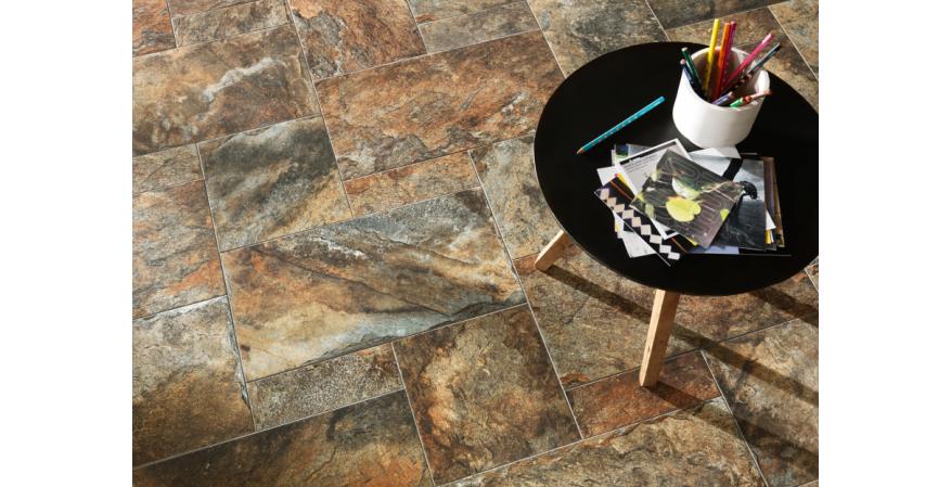 NovaBell  Firestone is a floor tile that is designed to simulate the look of the richest natural stone. It appears to have a 3-D surface but is smooth to the touch.