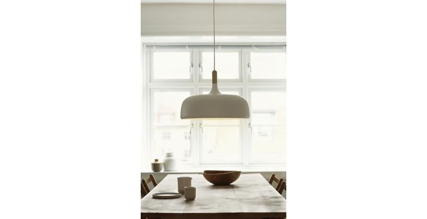 Part of the Stratos Collection, the Acorn pendant by designer Atle Tveit merges oak and painted aluminum to create a clean, warm modern look. The fixture measures 18-3/4 inches in diameter and 13-1/2 inches tall, and it comes in either white or gray. Global Lighting is the exclusive North American distributor of Acorn.