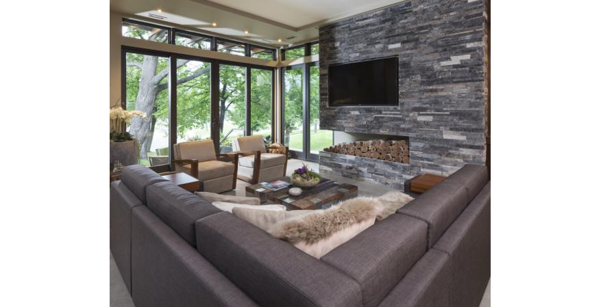 This modern residence offers a unique combination of privacy from adjacent homes. The home’s contemporary exterior features natural stone, corten steel, wood, and glass, all in perfect alignment with the site. The design goal was to take advantage of the views of Lake Calhoun by providing the homeowners with expansive walls of Integrity Wood-Ultrex Windows. With a small footprint and open design, stunning views are present in every room, making the stylish windows a huge focal point of the home.