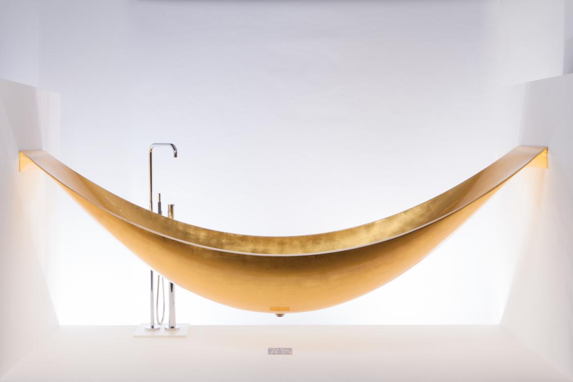Though striking as a freestanding model, Splinter Works’ Vessel is most compelling as a suspended hammock-style installation. Supported by stainless steel brackets at both ends, the tub comprises layers of carbon fiber and an insulating foam core and extends about 8 feet to 9 feet in length; custom sizes are available.