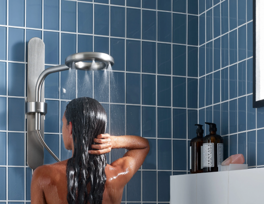 Moen Nebia Showering System bath woman showering