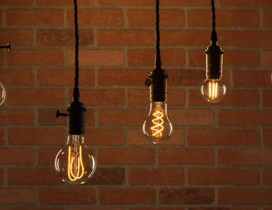 Feit Electric's LED Original Vintage Glass light bulbs shown in pendant lights