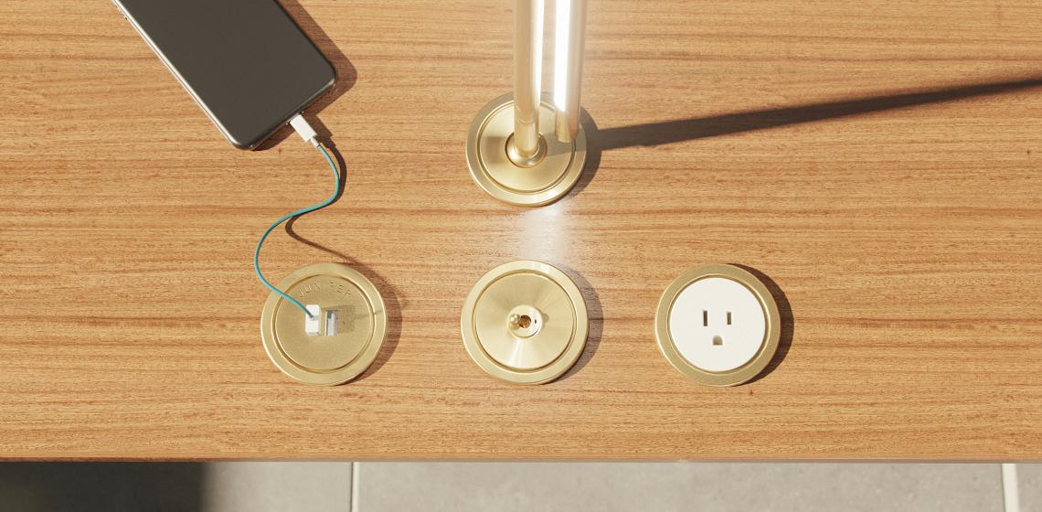Lighting manufacturer Juniper Design Studio has introduced a line of brass surface-mounted electrical accessories that draws inspiration from the dials and switches of mid-century NASA mission control rooms.