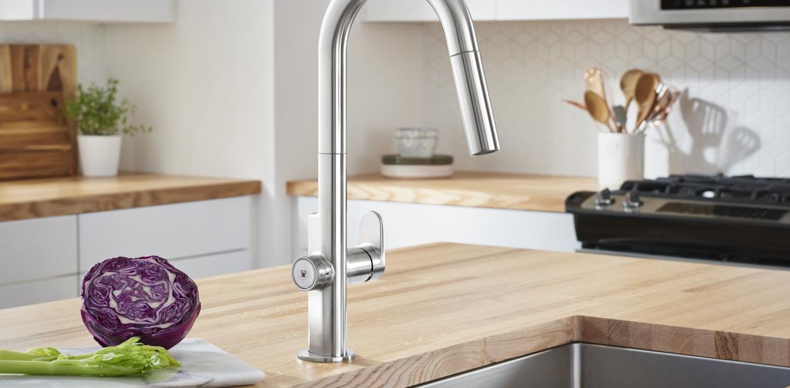 American Standard Beale MeasureFill electronic faucet one wood countertop