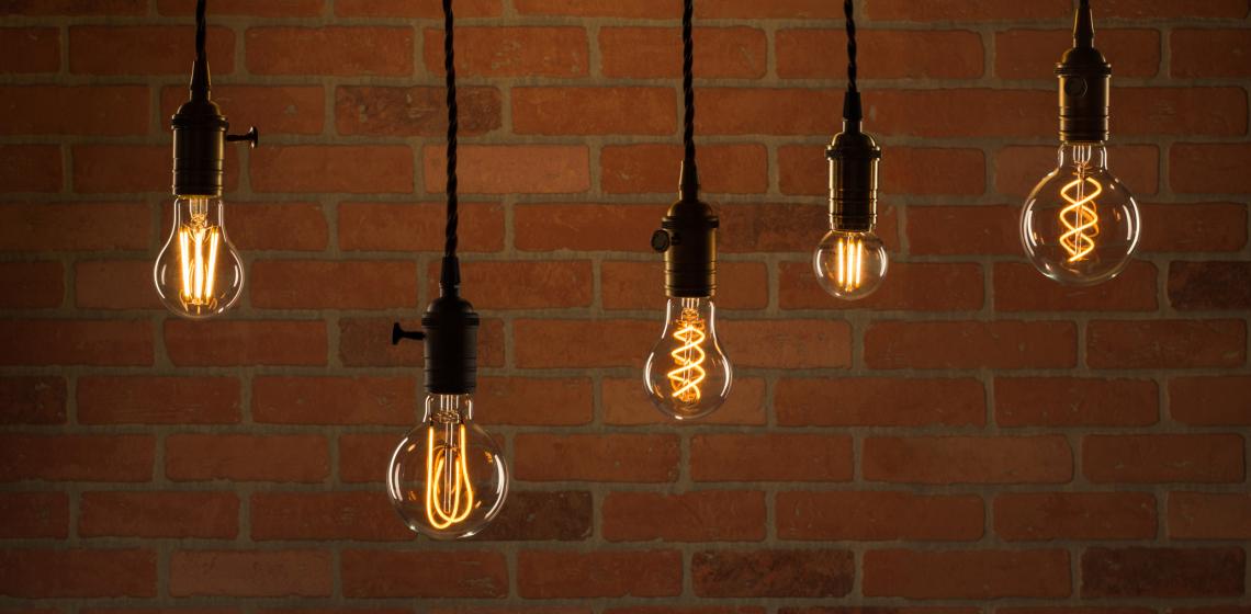 Feit Electric's LED Original Vintage Glass light bulbs shown in pendant lights