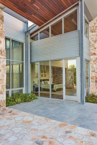 Petersen Aluminum Carson Design Associates Texas Hill Country Modern House Exterior Door detail