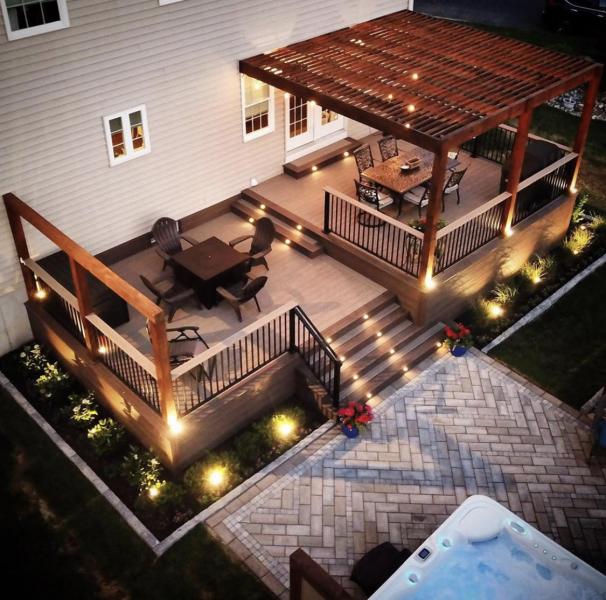 Wood composite deck at dusk with lighting