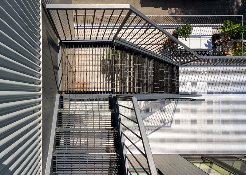 Chicago condominium modern iron stairwell