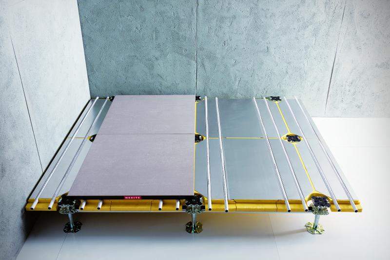 Diffuse is a radiant flooring system from Nesite made up of modular, removable finishing panels that is unique both because it’s raised and because it can be installed without cement screed.  